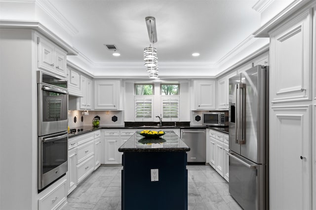 20234 Brondesbury Dr, Katy, TX 77450 - kitchen with stainless steel appliances, light marble finish floors, crown molding, a sink, and white cabinetry