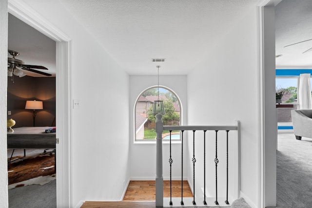 20234 Brondesbury Dr, Katy, TX 77450 - stairway with ceiling fan, plenty of natural light, and baseboards
