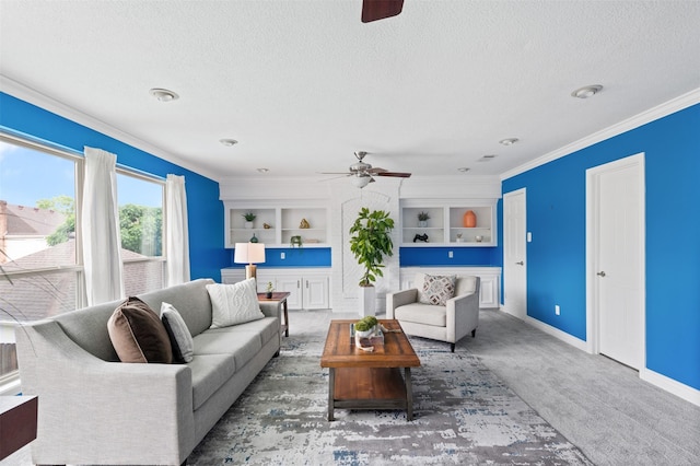 20234 Brondesbury Dr, Katy, TX 77450 - living area featuring a ceiling fan, a textured ceiling, crown molding, baseboards, and built in features