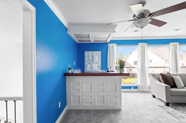 20234 Brondesbury Dr, Katy, TX 77450 - living area with carpet floors, crown molding, plenty of natural light, baseboards, and a textured ceiling