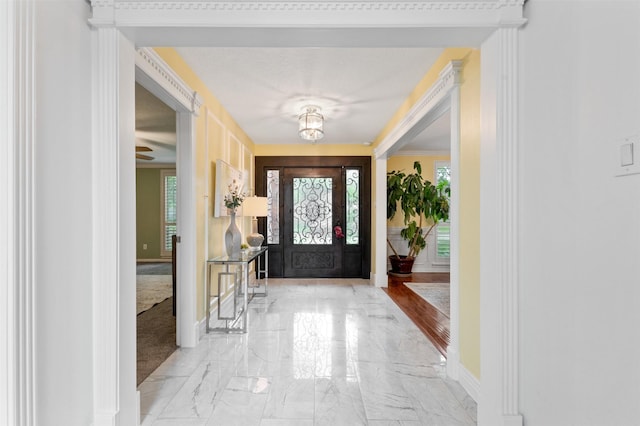 20234 Brondesbury Dr, Katy, TX 77450 - foyer entrance with light marble finish flooring, baseboards, and healthy amount of natural light