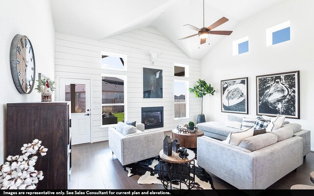 12106 Hollow Marsh Dr, Santa Fe, TX 77510 - living room with wood finished floors, ceiling fan, wood walls, a large fireplace, and high vaulted ceiling