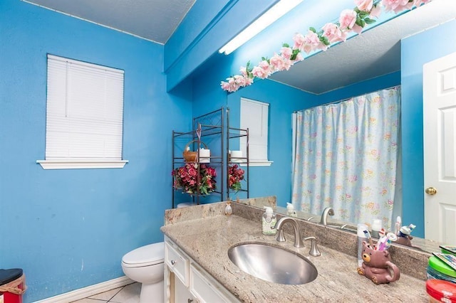 12356 Newbrook Dr, Houston, TX 77072 - bathroom with vanity, toilet, tile patterned floors, baseboards, and a shower with shower curtain