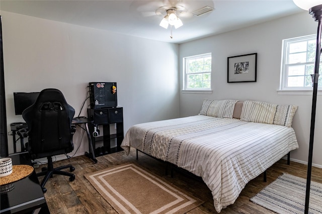 16003 Lone Shadow Trl, Stagecoach, TX 77355 - bedroom featuring wood finished floors, ceiling fan, and a desk