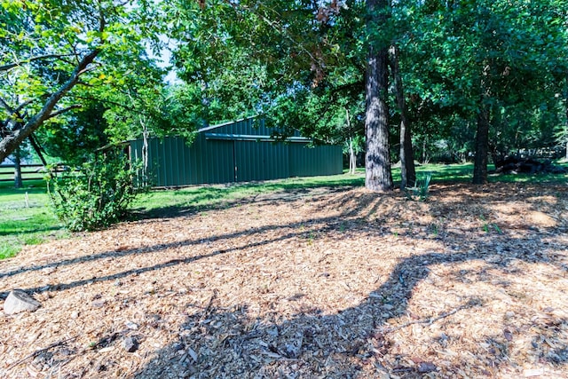 16003 Lone Shadow Trl, Stagecoach, TX 77355 - view of yard with an outbuilding