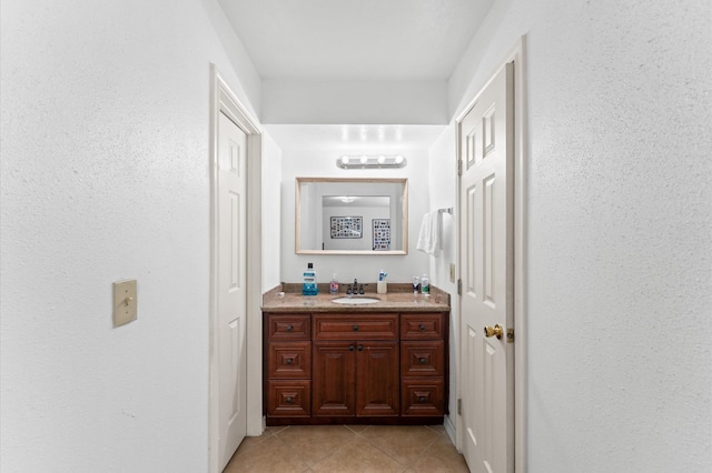 9207 Loren Ln, Houston, TX 77040 - bathroom with vanity and tile patterned flooring