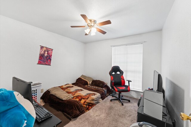 9207 Loren Ln, Houston, TX 77040 - carpeted bedroom featuring a ceiling fan and baseboards