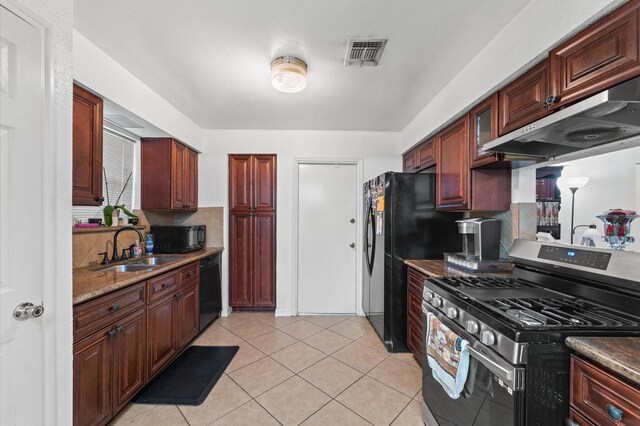 9207 Loren Ln, Houston, TX 77040 - kitchen featuring black appliances, under cabinet range hood, a sink, and decorative backsplash
