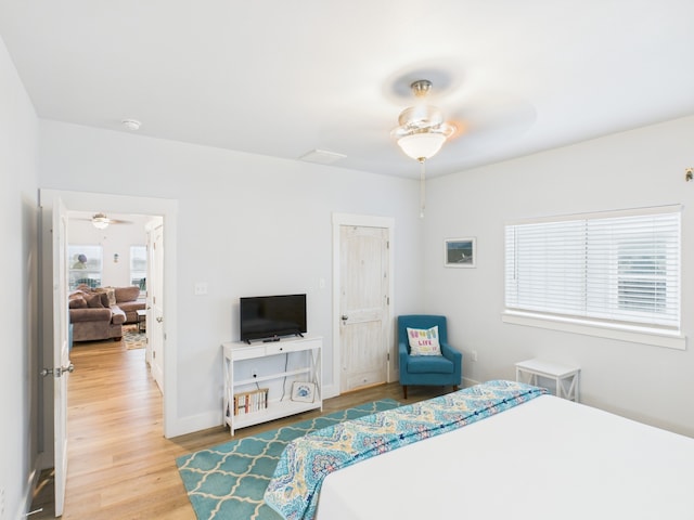 2403 S Bronte St, Rockport, TX 78382 - bedroom featuring wood finished floors and baseboards