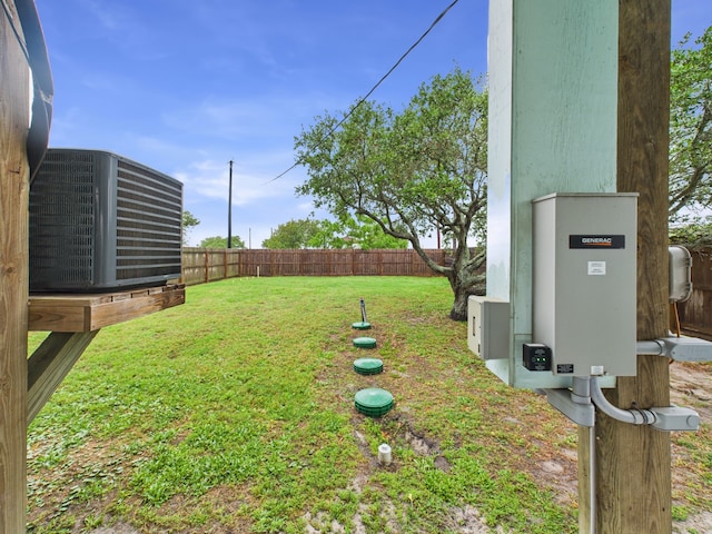 2403 S Bronte St, Rockport, TX 78382 - view of yard featuring central AC