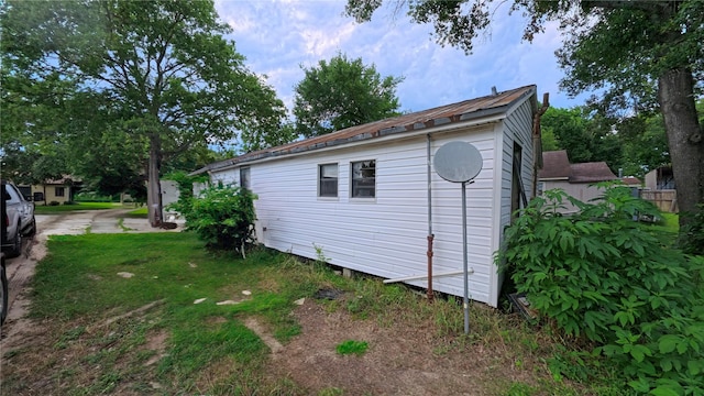 1203 Boulevard St, Bryan, TX 77803 - view of home's exterior with an outbuilding