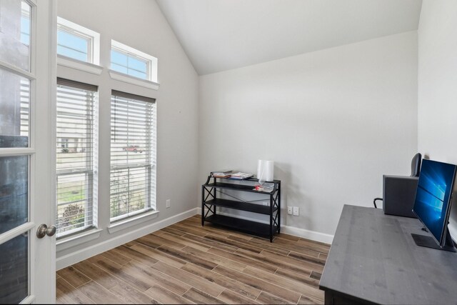 531 Campbell Dr, League City, TX 77573 - office featuring vaulted ceiling, wood finished floors, and baseboards