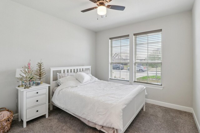 531 Campbell Dr, League City, TX 77573 - carpeted bedroom with multiple windows, baseboards, and ceiling fan