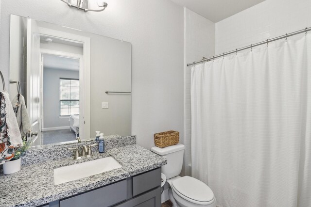 531 Campbell Dr, League City, TX 77573 - full bathroom featuring toilet, vanity, and a shower with curtain