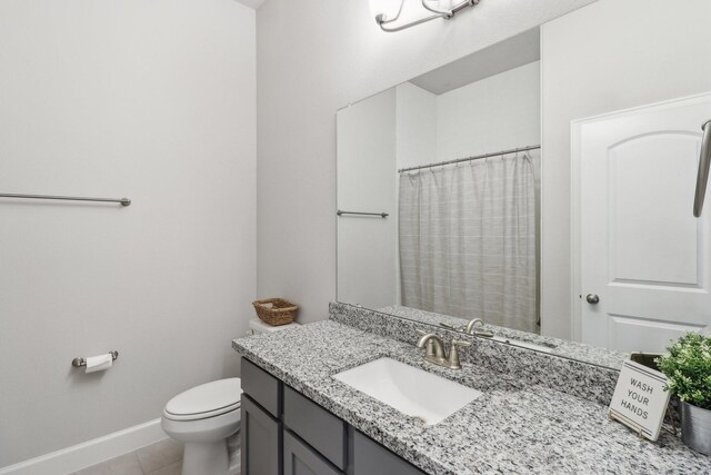 531 Campbell Dr, League City, TX 77573 - full bathroom featuring vanity, toilet, baseboards, tile patterned flooring, and a shower with curtain