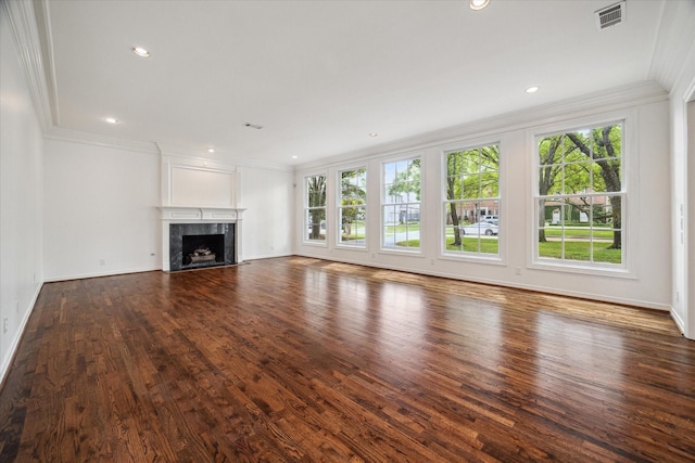 10918 Wickline Dr, Hunters Creek Village, TX 77024 - unfurnished living room with healthy amount of natural light, ornamental molding, a high end fireplace, dark wood-type flooring, and baseboards