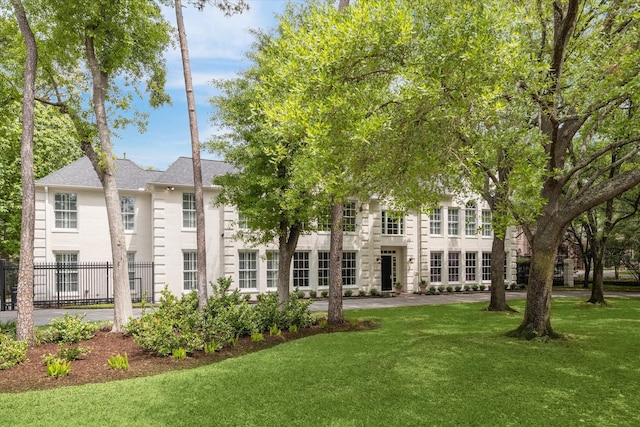 10918 Wickline Dr, Hunters Creek Village, TX 77024 - rear view of property with a shingled roof