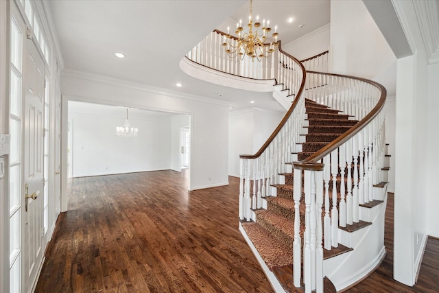 10918 Wickline Dr, Hunters Creek Village, TX 77024 - foyer featuring a chandelier, ornamental molding, wood finished floors, stairs, and recessed lighting