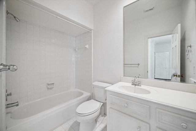 10918 Wickline Dr, Hunters Creek Village, TX 77024 - bathroom featuring toilet, vanity, tile patterned flooring, and washtub / shower combination