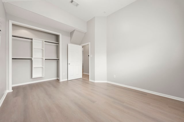 3639 Burning Palms Ct, Houston, TX 77042 - unfurnished bedroom featuring light wood finished floors, a closet, and baseboards