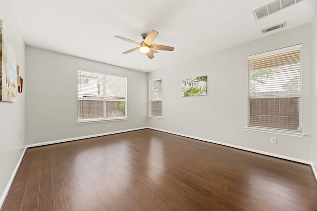 3639 Burning Palms Ct, Houston, TX 77042 - spare room with a ceiling fan, baseboards, and dark wood-type flooring