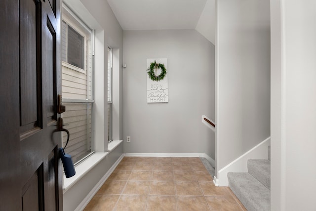 3639 Burning Palms Ct, Houston, TX 77042 - entryway with light tile patterned floors and baseboards