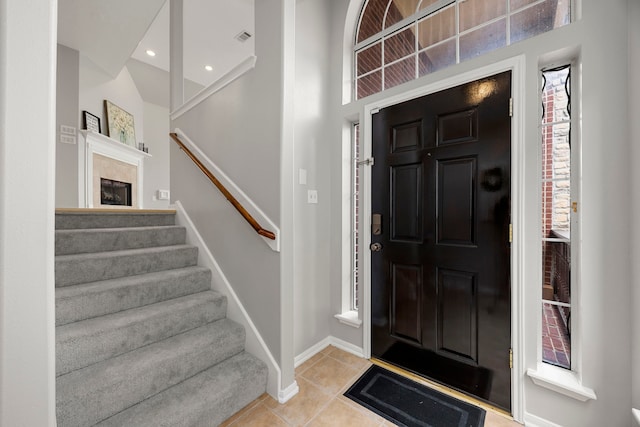 3639 Burning Palms Ct, Houston, TX 77042 - tiled foyer featuring stairs and baseboards