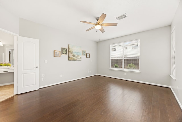 3639 Burning Palms Ct, Houston, TX 77042 - unfurnished room with ceiling fan, dark wood-type flooring, and baseboards