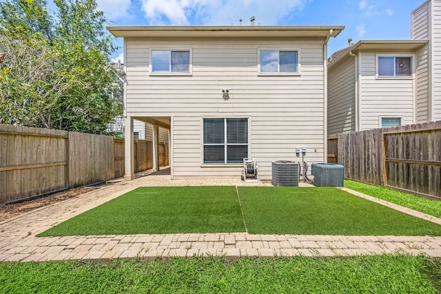 3639 Burning Palms Ct, Houston, TX 77042 - back of house with central air condition unit