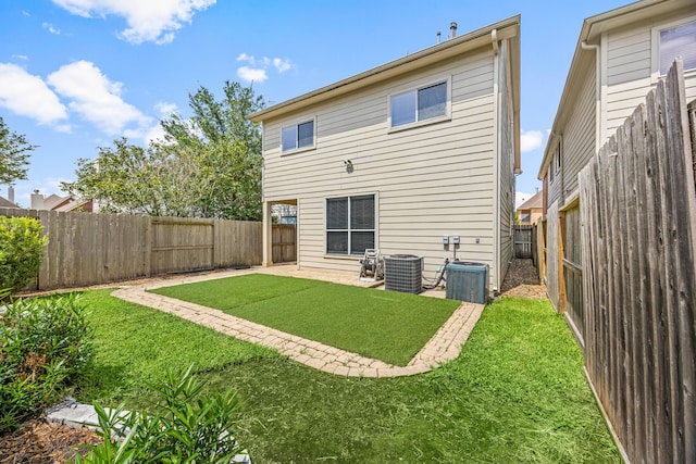 3639 Burning Palms Ct, Houston, TX 77042 - rear view of house with cooling unit and a patio