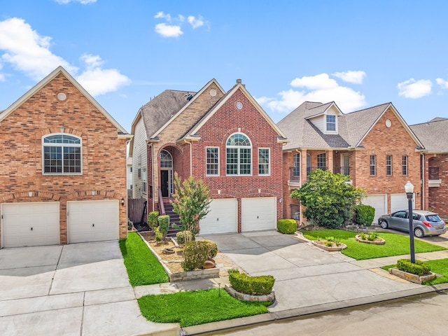 3639 Burning Palms Ct, Houston, TX 77042 - view of front of property featuring a garage, brick siding, and driveway