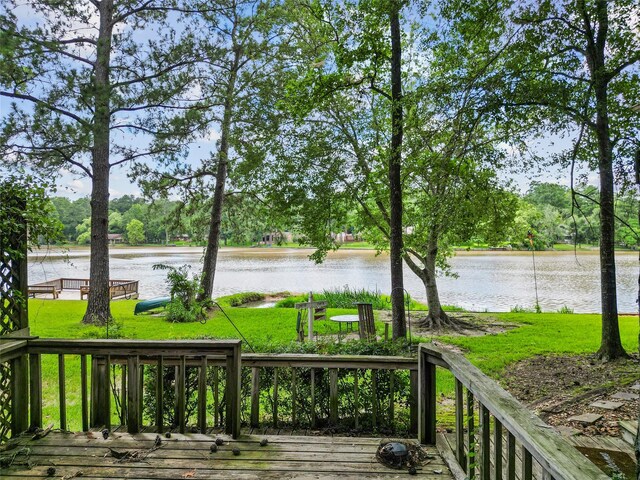 1925 E Lake Dr, Huntsville, TX 77340 - wooden terrace featuring a water view and a yard