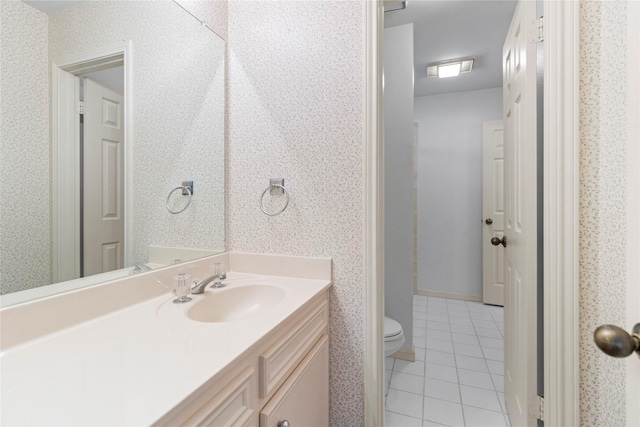 1925 E Lake Dr, Huntsville, TX 77340 - bathroom with tile patterned flooring, toilet, and vanity
