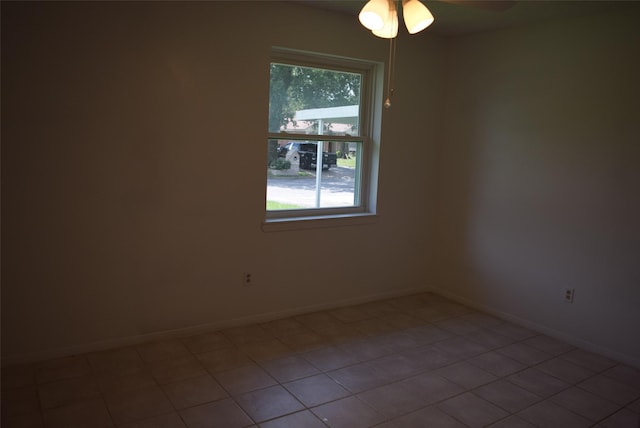 611 Glenvale Dr, Houston, TX 77060 - tiled empty room featuring baseboards and ceiling fan