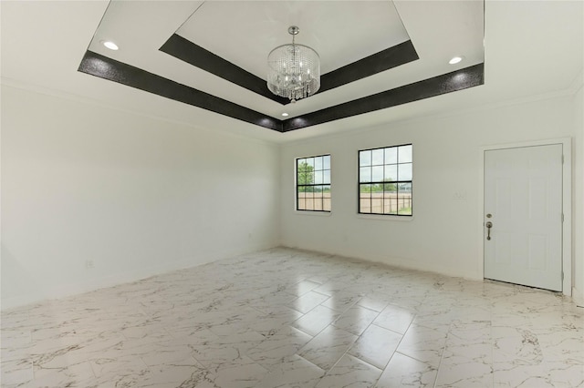 6193 Rd 5503, Cleveland, TX 77327 - empty room with a chandelier, a raised ceiling, crown molding, baseboards, and recessed lighting