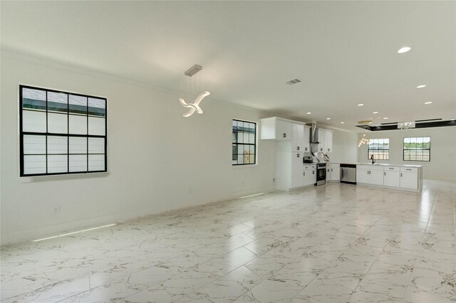 6193 Rd 5503, Cleveland, TX 77327 - unfurnished living room with ornamental molding, recessed lighting, and baseboards