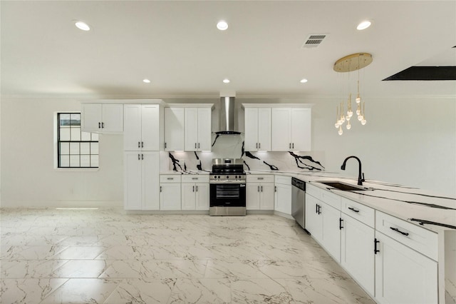 6193 Rd 5503, Cleveland, TX 77327 - kitchen featuring appliances with stainless steel finishes, wall chimney exhaust hood, a sink, ornamental molding, and a peninsula