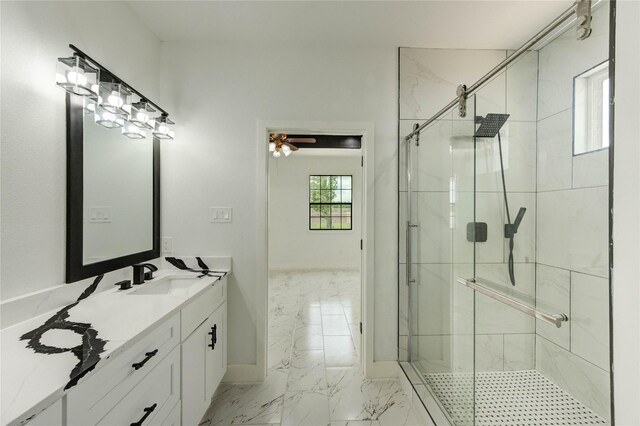 6193 Rd 5503, Cleveland, TX 77327 - full bath featuring marble look tiles, a shower stall, vanity, and baseboards