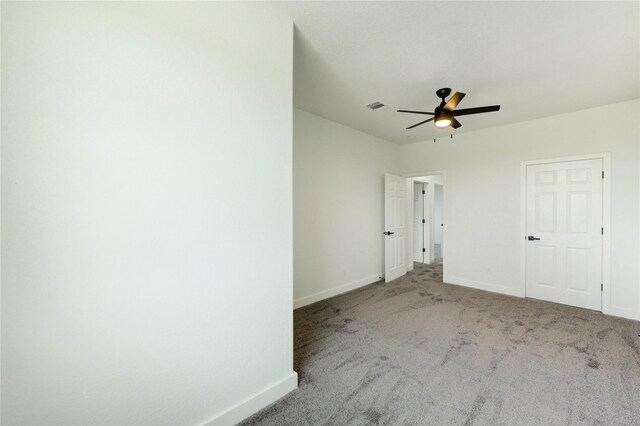 6193 Rd 5503, Cleveland, TX 77327 - unfurnished bedroom with baseboards, carpet flooring, and a ceiling fan