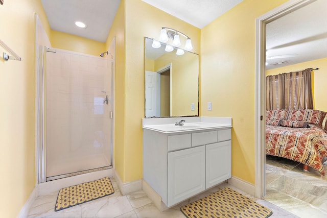 11622 Silent Elm St, Houston, TX 77044 - bathroom featuring vanity, a shower stall, baseboards, and recessed lighting