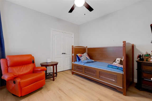 6003 Tarra Firma Dr, Spring, TX 77379 - bedroom featuring light wood-type flooring, ceiling fan, and a closet