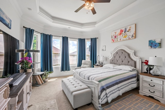 4314 Hadleigh Ln, College Station, TX 77845 - carpeted bedroom featuring ornamental molding, a tray ceiling, and ceiling fan
