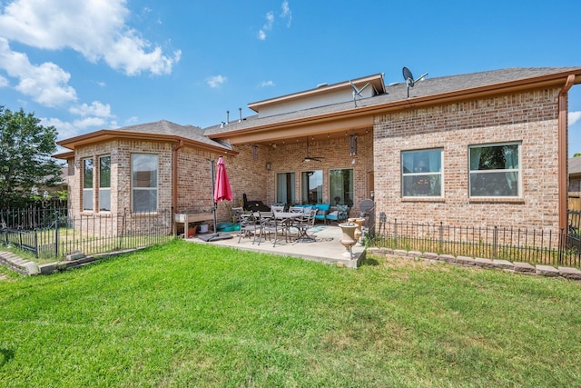 4314 Hadleigh Ln, College Station, TX 77845 - back of house with a ceiling fan, a patio, and brick siding