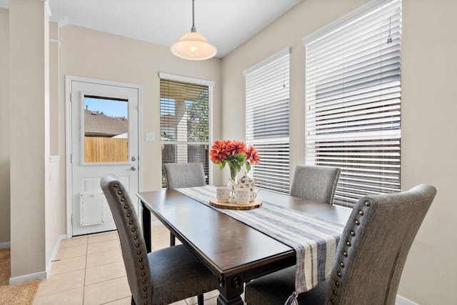 2943 Smokey Forest Ln, Spring, TX 77386 - dining room with plenty of natural light, baseboards, and light tile patterned floors