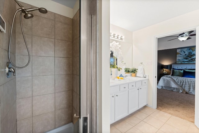 2943 Smokey Forest Ln, Spring, TX 77386 - full bath with ensuite bathroom, vanity, tile patterned floors, and ceiling fan