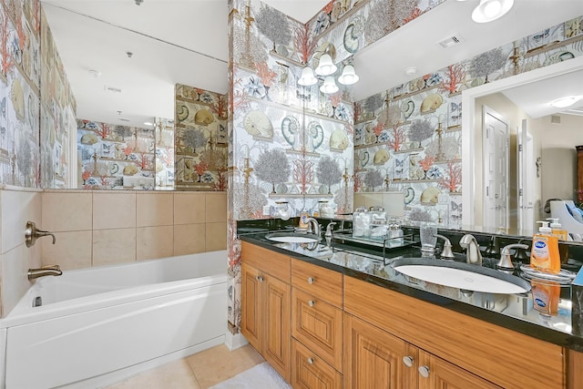 801 E Beach Dr Unit Bc2305, Galveston, TX 77550 - bathroom featuring double vanity, tile patterned flooring, and wallpapered walls