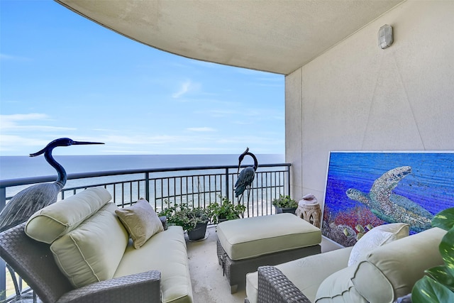 801 E Beach Dr Unit Bc2305, Galveston, TX 77550 - balcony featuring a water view and an outdoor hangout area