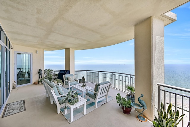801 E Beach Dr Unit Bc2305, Galveston, TX 77550 - balcony with a water view and an outdoor living space