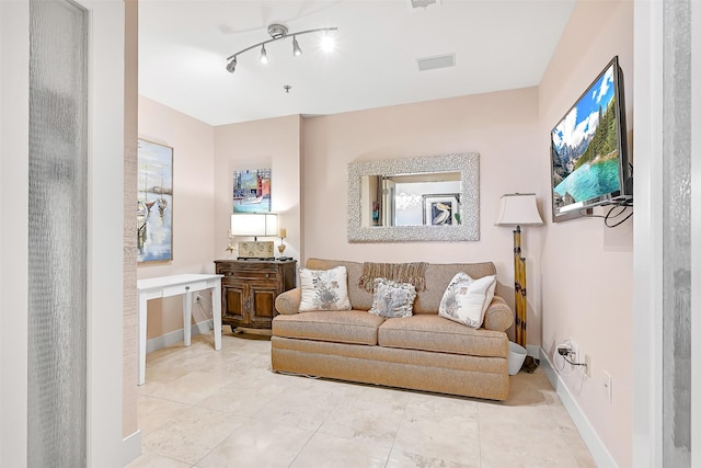 801 E Beach Dr Unit Bc2305, Galveston, TX 77550 - living area featuring baseboards and tile patterned floors
