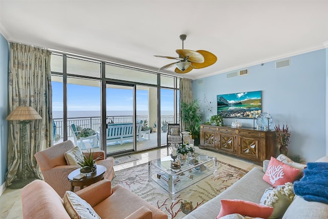 801 E Beach Dr Unit Bc2305, Galveston, TX 77550 - living room featuring ornamental molding, a ceiling fan, floor to ceiling windows, and light tile patterned floors